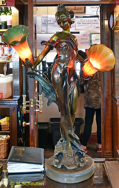 Art Deco Statuette on Bar Counter.  by Michael Schouten. Published on 